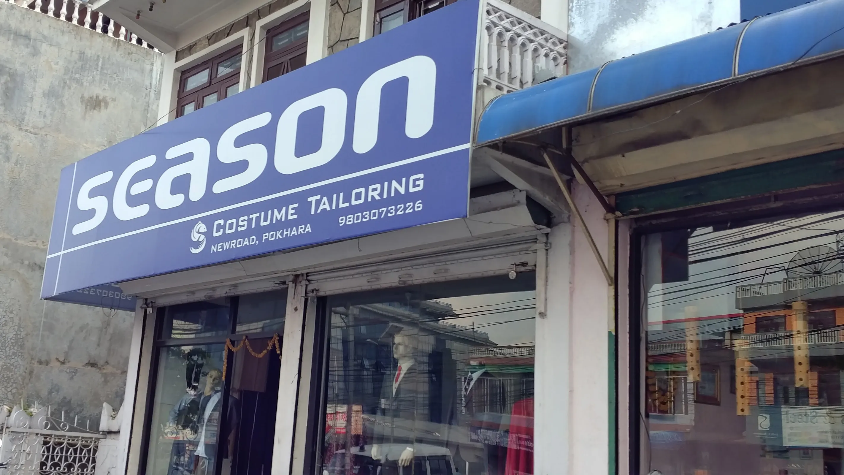 Season Costume Tailoring shop sign on Newroad, Pokhara