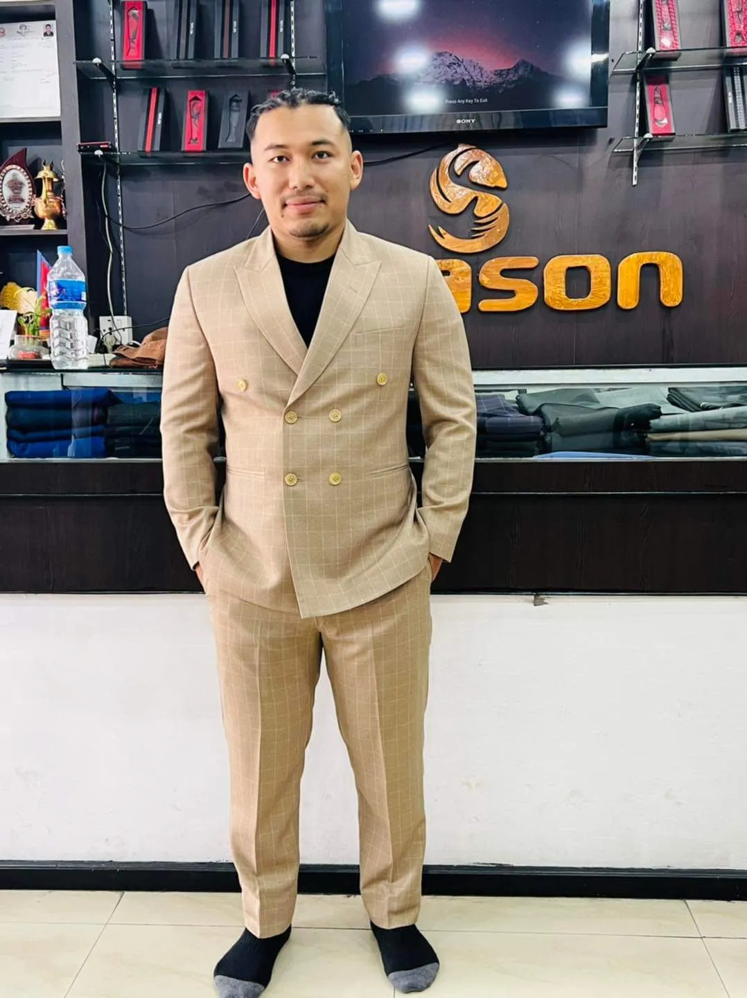 Camel windowpane double-breasted suit