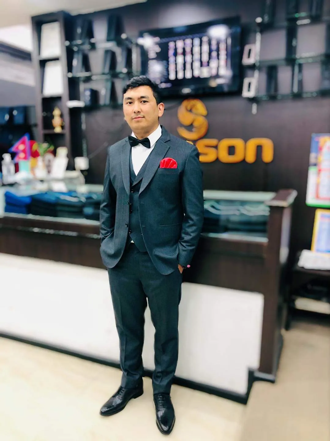Charcoal evening three-piece suit with bow tie